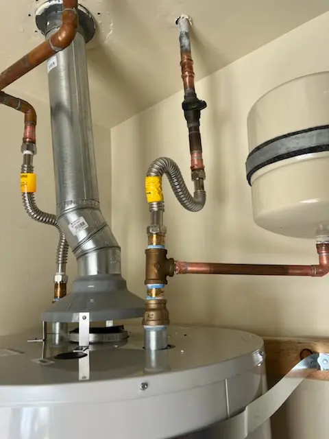 Water heater installation and plumbing repair in Sims